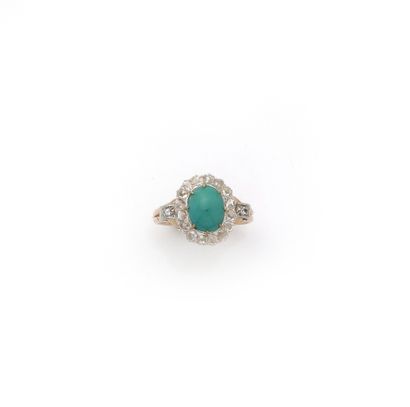 Bague en or deux tons 18K (750/1000) centrée...