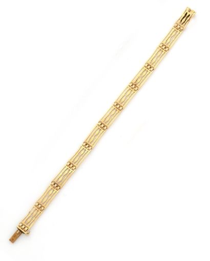Bracelet en or jaune 18K (750/1000) composé...