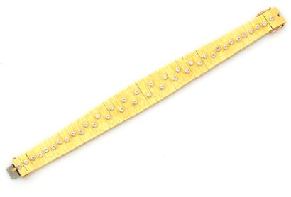 Bracelet en or jaune 18K (750/1000) à maille...