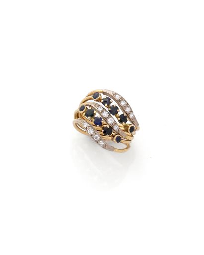 Bague cinq anneaux en or jaune 18K (750/1000)...