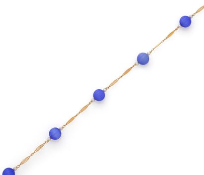 Collier en or jaune 18K (750/1000) composé...