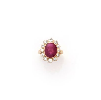 Bague pompadour or jaune 18K (750/1000) centrée...