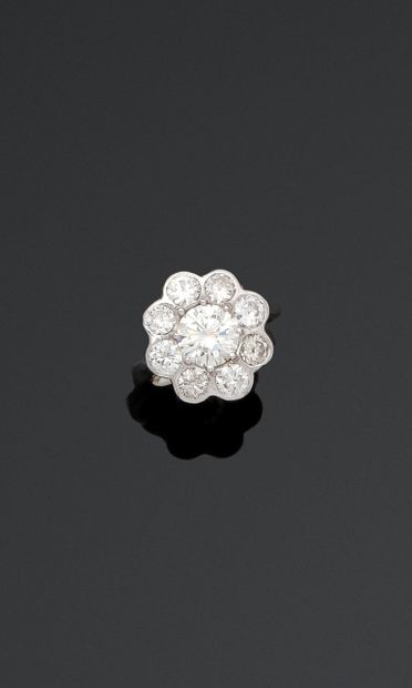Bague marguerite en or gris 18K (750/1000)...