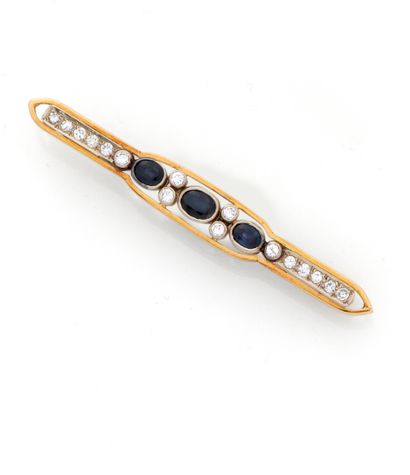 Broche barrette en or jaune 18K (750/1000)...