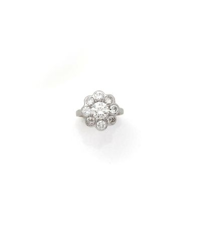 Bague marguerite en or gris 18K (750/1000)...