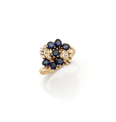 Bague en or jaune 14K (585/1000) stylisant...