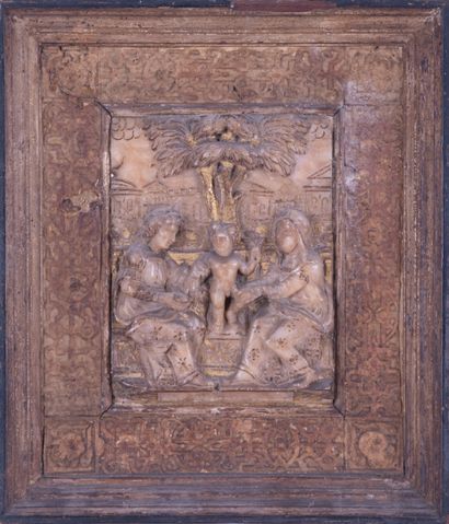 Alabaster plaque carved in relief with gold...
