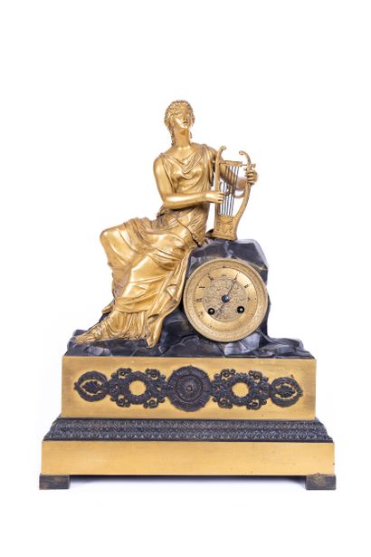 Gilded bronze clock representing a woman...
