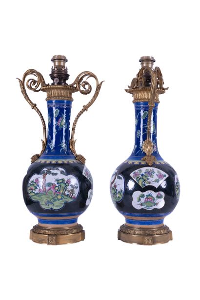 Pair of enamelled stoneware vases decorated...
