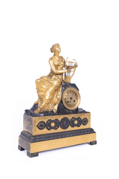 Gilded bronze clock representing a woman...