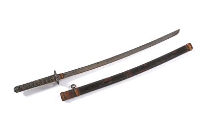 Sabre dit Katana indochinois.

Poignée façon...