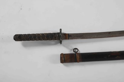 Sabre dit Katana indochinois.

Poignée façon...