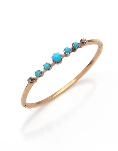 Bracelet jonc en or jaune 18K (750/1000)...