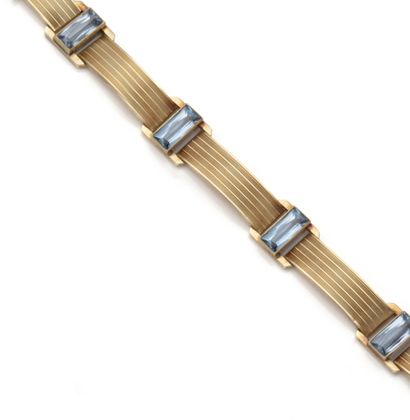 Bracelet en or jaune 14K (585/1000) composé...