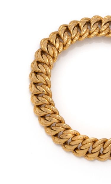 Bracelet en or jaune 18K (750/1000) à mailles...