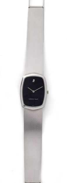 
Audemars Piguet

Montre de ville en or gris...
