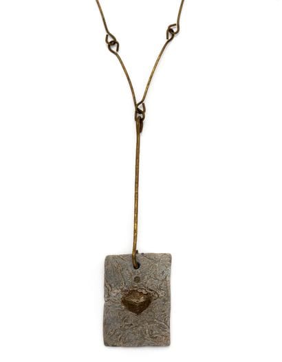 ANONYME 

Collier en laiton composé de tiges...