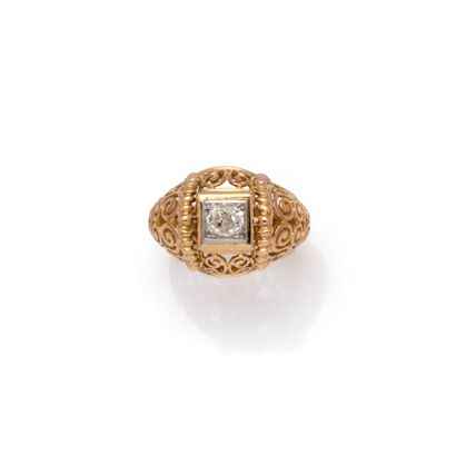 Bague en or jaune 18K (750/1000) et platine...
