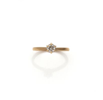 Solitaire en or jaune 18K (750/1000) orné...
