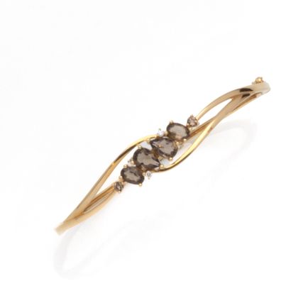 Bracelet jonc en or jaune 18K (750/1000)...