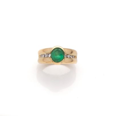 Bague jonc en or jaune 18K (750/1000) ornée...