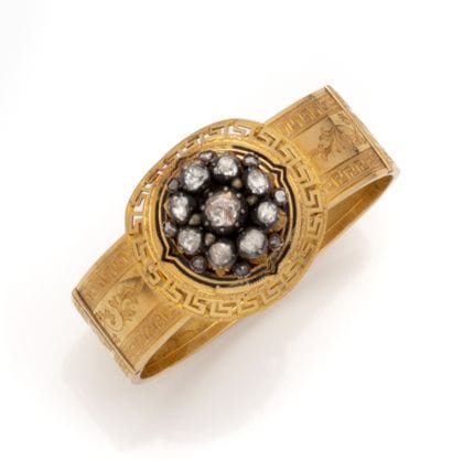 Bracelet en or jaune 18K (750/1000) et argent...