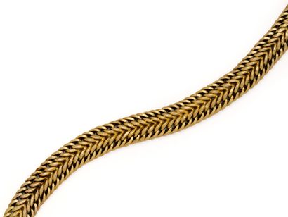 Bracelet en or jaune 18K (750/1000) à mailles...