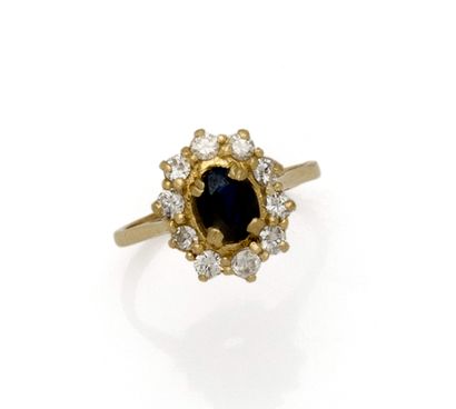 Bague marguerite en or jaune 18K (750/1000)...