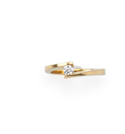 Solitaire en or jaune 18K (750/1000) orné...