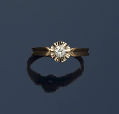 Solitaire en or jaune 18K (750/1000) orné...