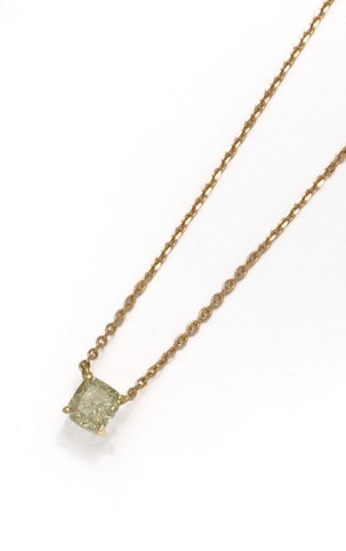 Collier en or jaune 18K (750/1000) orné d'un...