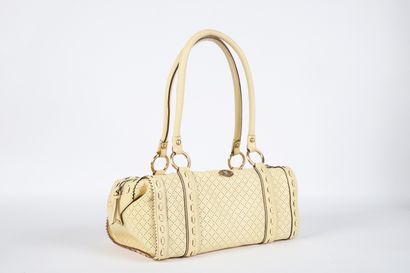 CÉLINE
32 cm bag, yellow perforated leather,...