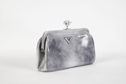 PRADA
Grey glacé leather maxi clutch bag
Slight...