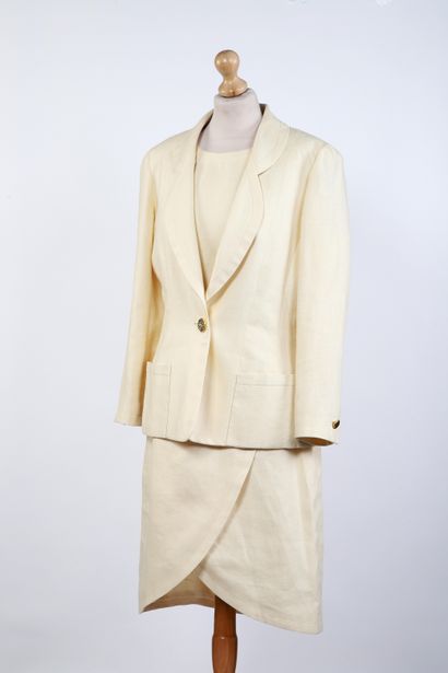 CHANEL Boutique
Beige linen ensemble including...