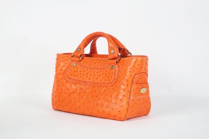 CÉLINE, circa 2004
Boggy 31 cm bag, in orange...