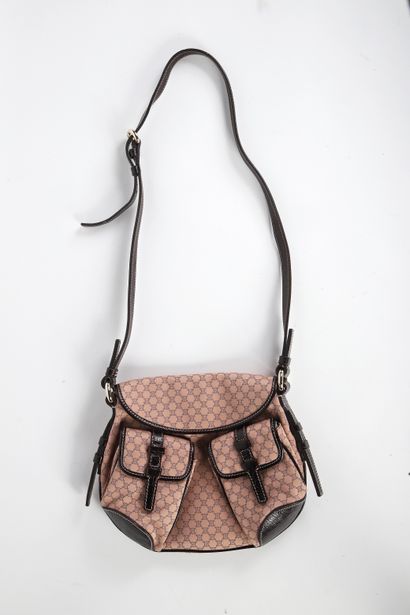 CÉLINE
Pink triomphe canvas bag trimmed in...
