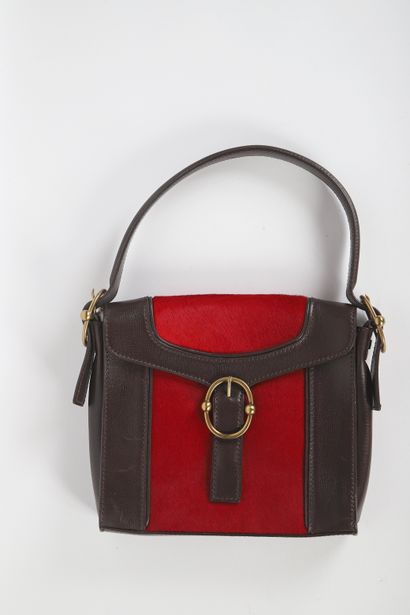 CÉLINE
Bag in red cowhide and brown leather,...