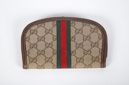 GUCCI
Mini wallet in coated canvas and stable...