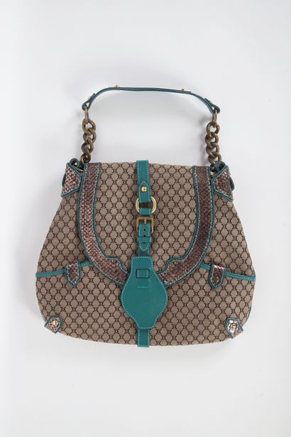 CÉLINE
Triumph canvas and turquoise leather...