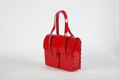 CÉLINE
Satchel bag in red patent leather,...