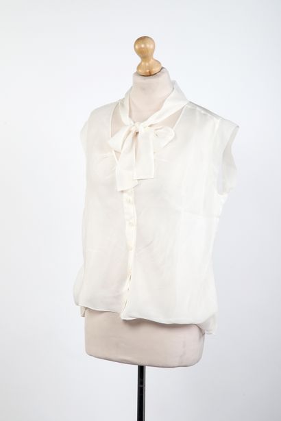 CHANEL
Sheer ecru crepe blouse with lavallière...