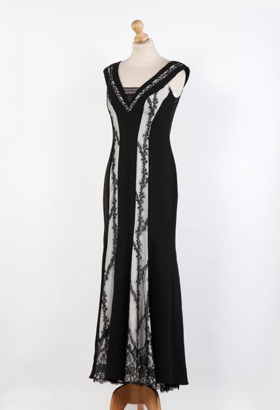 AMENAPHI, SANDRO 
Set includes a black dress...
