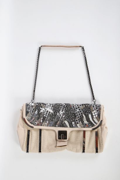 CÉLINE
34 cm clutch bag in knitted ecru leather,...