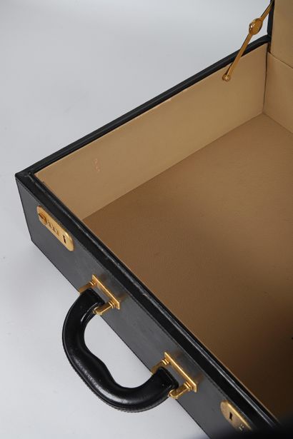Christian DIOR
Black leather attaché case,...