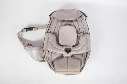 CÉLINE
Asymmetrical backpack in ecru reptile-effect...