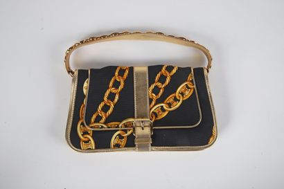 CÉLINE
Canvas bag printed with bracelets...
