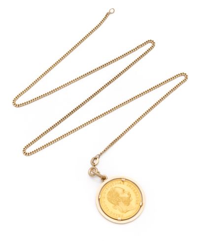 Pendant in 14K (585/1000) yellow gold adorned...