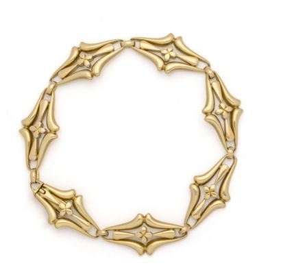 Bracelet en or jaune 18K (750/1000) composé...