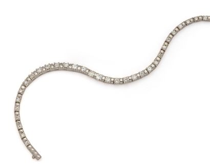 Bracelet tennis en or gris 18K (750/1000)...