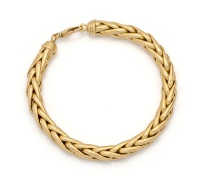 Bracelet en or jaune 18K (750/1000) à mailles...